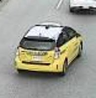 A blurred crop of the yellow taxi