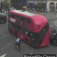 A crop of red double-decker bus 9