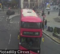 A crop of red double-decker bus 38