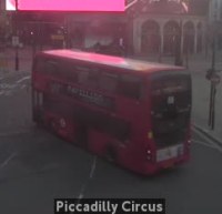 A crop of red double-decker bus 88