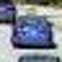 A crop of blue sedan 123