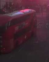 A crop of red double-decker bus 27