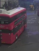 A crop of red double-decker bus 22