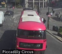 A crop of red double-decker bus 19