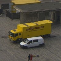 A crop of white truck DHL