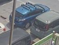 A crop of the blue hatchback