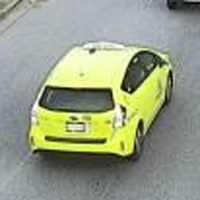 A crop of the yellow hatchback