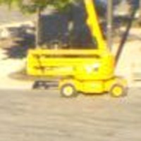 A crop of the yellow excavator